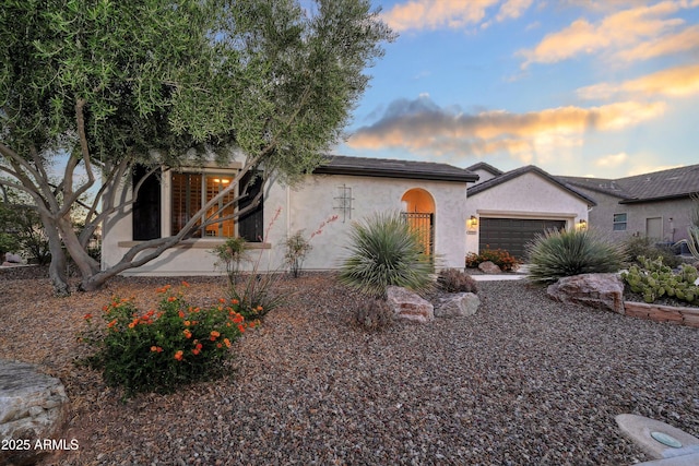 32128 S Bighorn Dr, Oracle, AZ 85623 - view of front of property with stucco siding and an attached garage