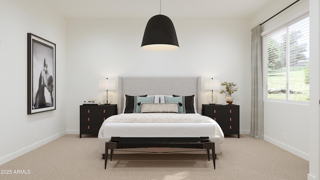 carpeted bedroom with multiple windows and baseboards