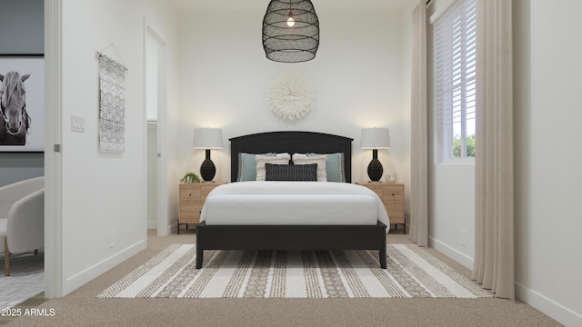 bedroom with baseboards and carpet floors
