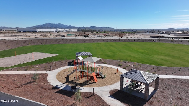 view of grassy yard featuring a mountain view and a gazebo