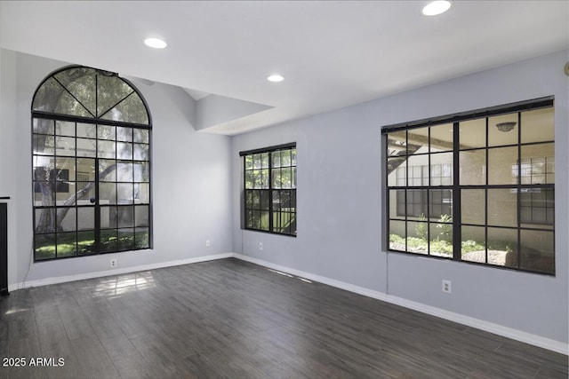 2333 E Southern Ave Unit 1015, Tempe, AZ 85282 - unfurnished room with dark wood-style flooring and recessed lighting