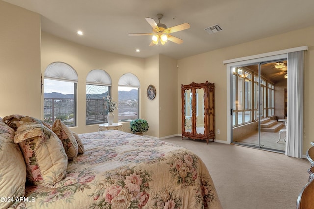 carpeted bedroom featuring ceiling fan and access to outside