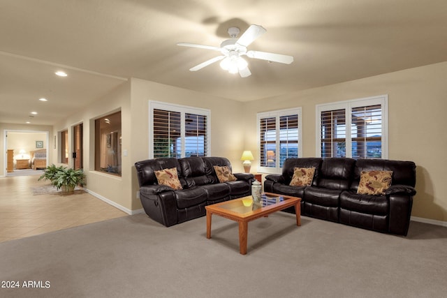 living room with carpet flooring and ceiling fan