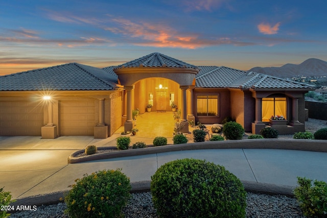 view of front of home with a garage