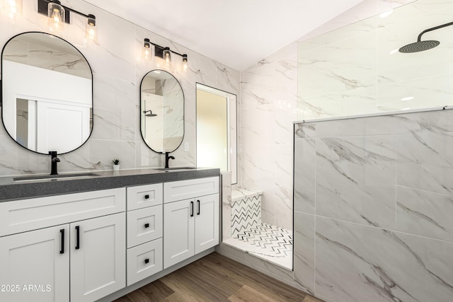 1710 S Aaron, Mesa, AZ 85209 - bathroom with a marble finish shower, double vanity, vaulted ceiling, and wood finished floors