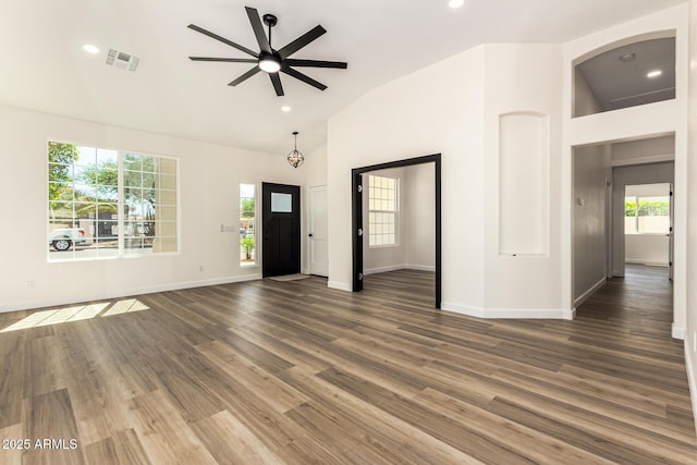 1710 S Aaron, Mesa, AZ 85209 - unfurnished living room featuring ceiling fan, wood finished floors, baseboards, recessed lighting, and high vaulted ceiling