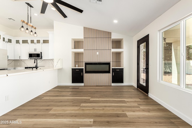 1710 S Aaron, Mesa, AZ 85209 - kitchen with vaulted ceiling, freestanding refrigerator, light countertops, a ceiling fan, and white cabinetry