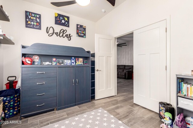 bedroom with ceiling fan and wood finished floors