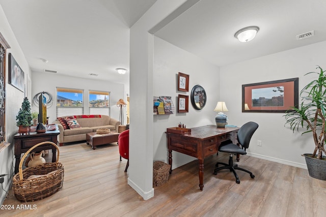 home office with light wood-type flooring