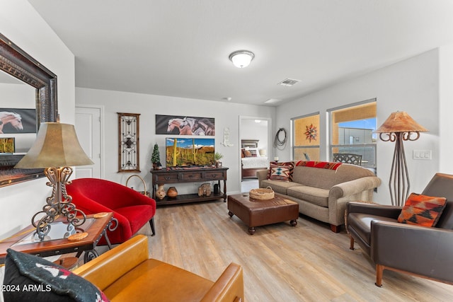 living room with light hardwood / wood-style floors