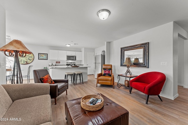 living room featuring light wood-type flooring