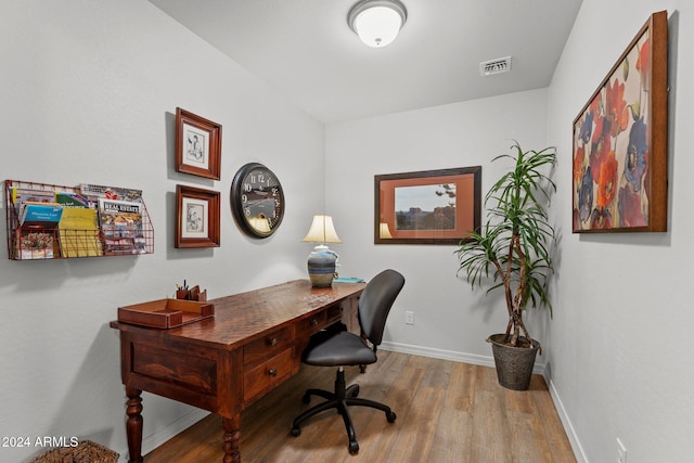 office space featuring light hardwood / wood-style flooring