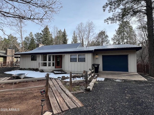 single story home featuring a garage