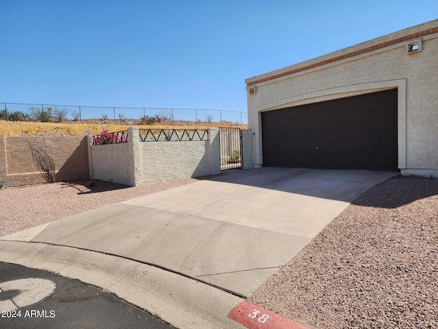 view of side of property featuring a garage