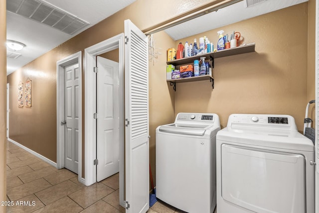 laundry area featuring separate washer and dryer