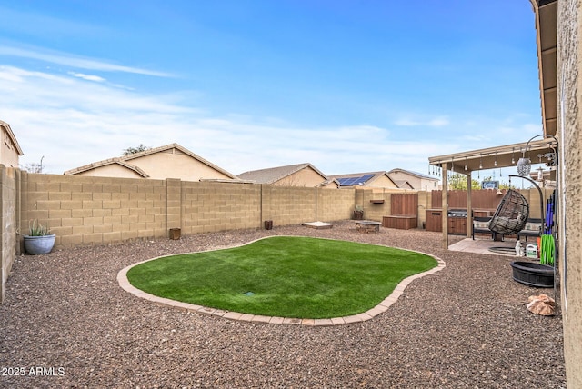 view of yard featuring a patio and an outdoor fire pit