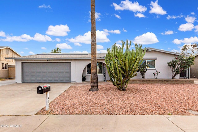 single story home with a garage