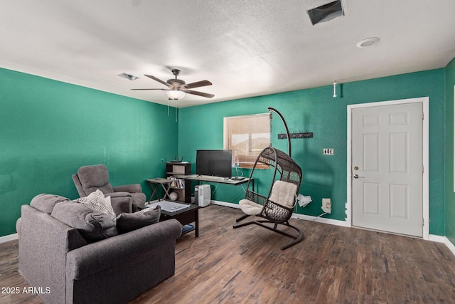 38222 N 19th Ave, Phoenix, AZ 85086 - living room with wood finished floors, baseboards, ceiling fan, and a textured ceiling