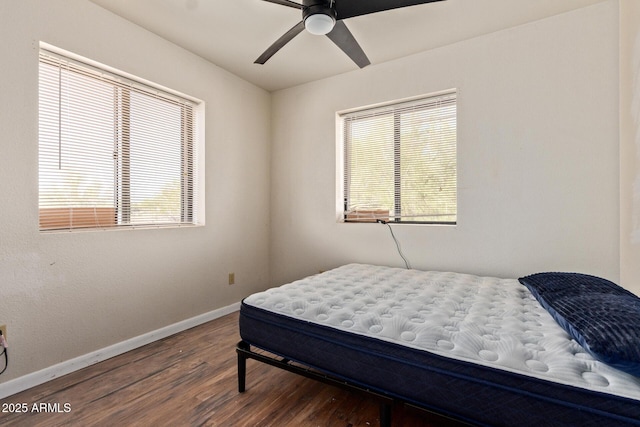 38222 N 19th Ave, Phoenix, AZ 85086 - bedroom featuring multiple windows, wood finished floors, baseboards, and ceiling fan