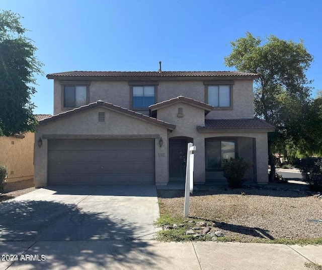 view of front of home with a garage