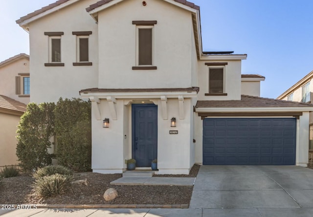 view of front of property with a garage