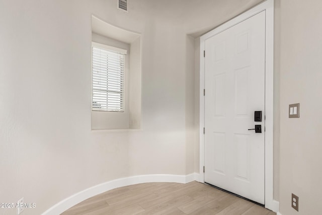 foyer featuring light wood-type flooring