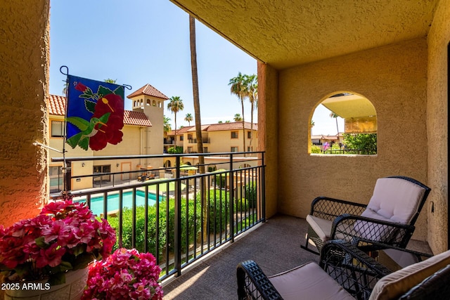 10330 W Thunderbird Blvd Unit C207, Sun City, AZ 85351 - balcony with view of pool area
