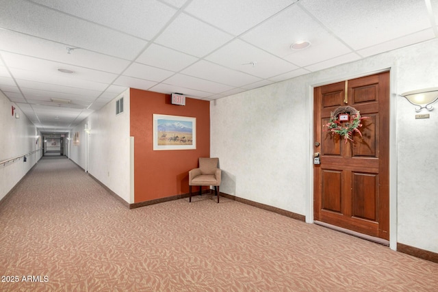 10330 W Thunderbird Blvd Unit C207, Sun City, AZ 85351 - hallway featuring light carpet and a paneled ceiling