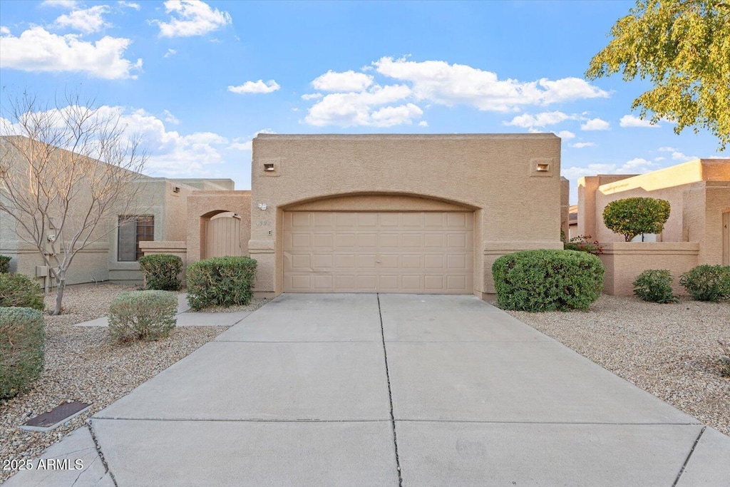 adobe home with a garage