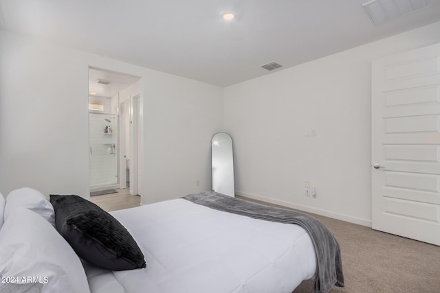 bedroom with carpet flooring, visible vents, and baseboards