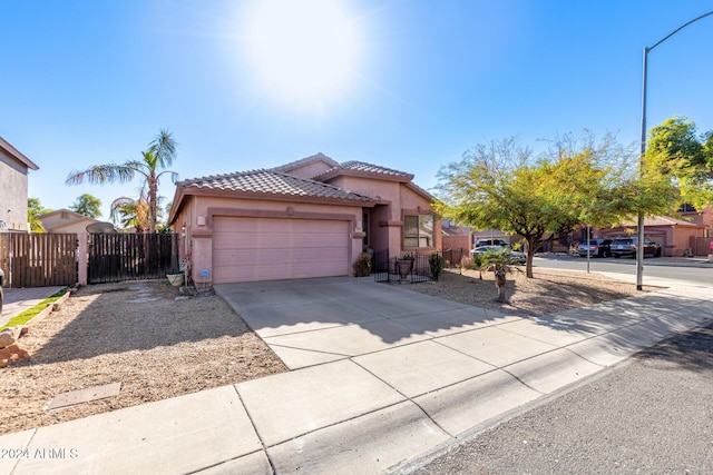 view of front of property with a garage