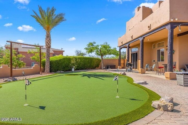 view of home's community with a patio