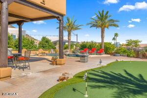 view of property's community with a patio area