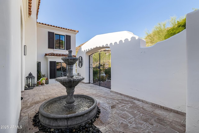 view of patio / terrace featuring a gate