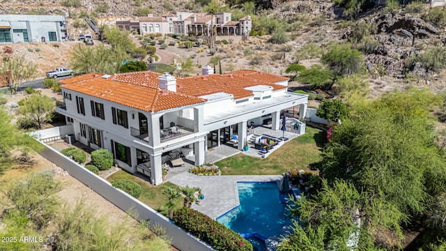 view from above of property featuring a pool area