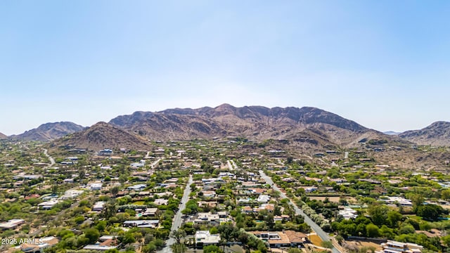 aerial perspective of suburban area with a mountainous background