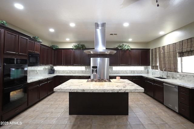 kitchen with backsplash, black appliances, visible vents, island range hood, and a sink