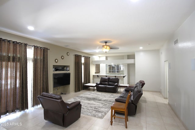 living room featuring visible vents, ceiling fan, recessed lighting, and light tile patterned floors