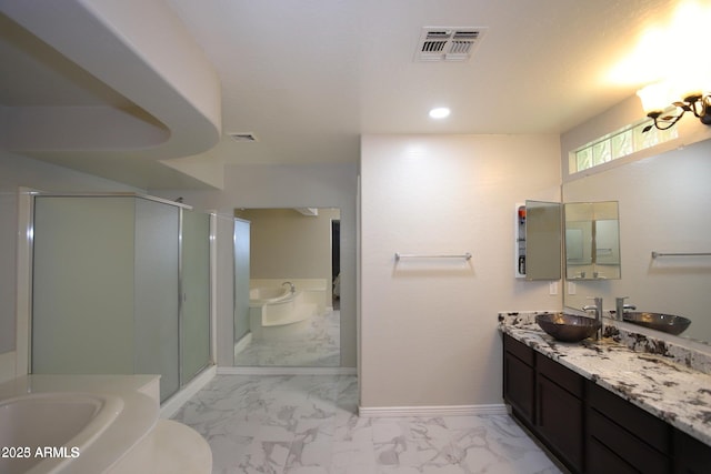 bathroom with visible vents, a bath, baseboards, marble finish floor, and a stall shower