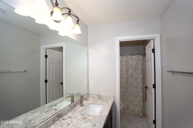 bathroom featuring visible vents, a shower with curtain, toilet, vanity, and marble finish floor