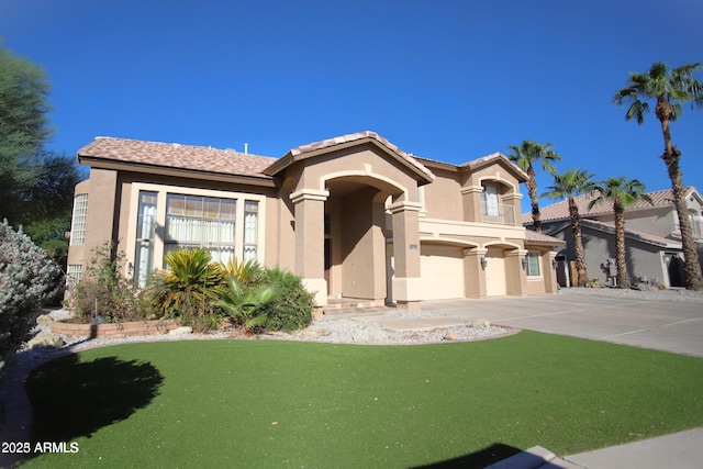 mediterranean / spanish-style home featuring concrete driveway, stucco siding, and an attached garage