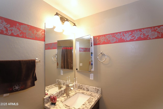 full bath featuring vanity