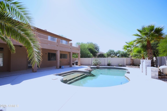 view of swimming pool featuring a patio, a fenced backyard, and a fenced in pool