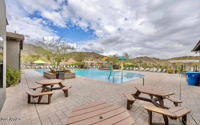 community pool with a patio