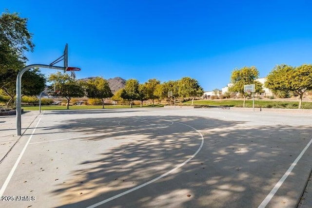 view of basketball court featuring community basketball court and a mountain view