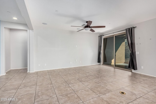 empty room featuring ceiling fan, light tile patterned floors, baseboards, and recessed lighting