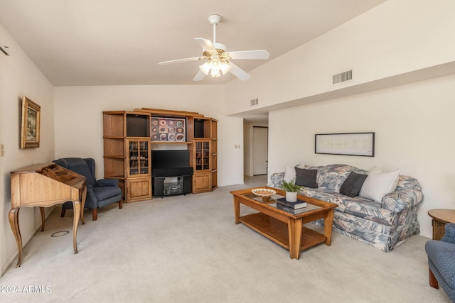 living area with lofted ceiling, visible vents, a ceiling fan, and light colored carpet