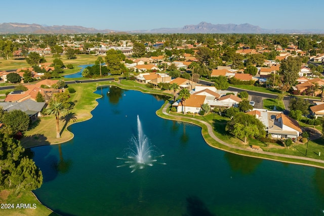 bird's eye view featuring a residential view and a water and mountain view