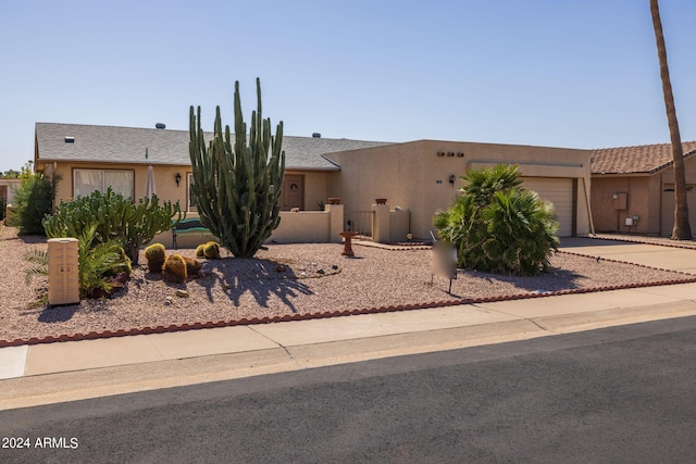 view of front of home featuring a garage