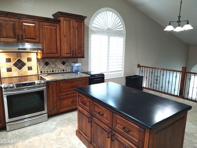 kitchen with decorative backsplash, stainless steel range oven, lofted ceiling, and an inviting chandelier